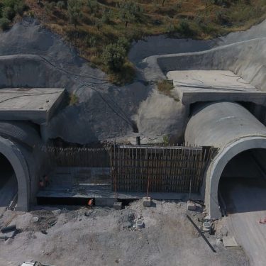 High-angle view of a construction site with two tunnels in Çanakkale, Turkey.